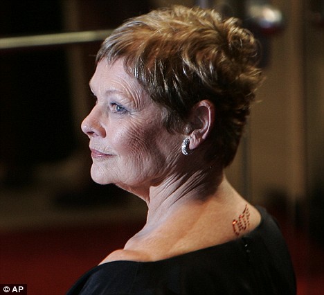 British actress Judi Dench arrives for the Royal World Premiere of the 22nd 